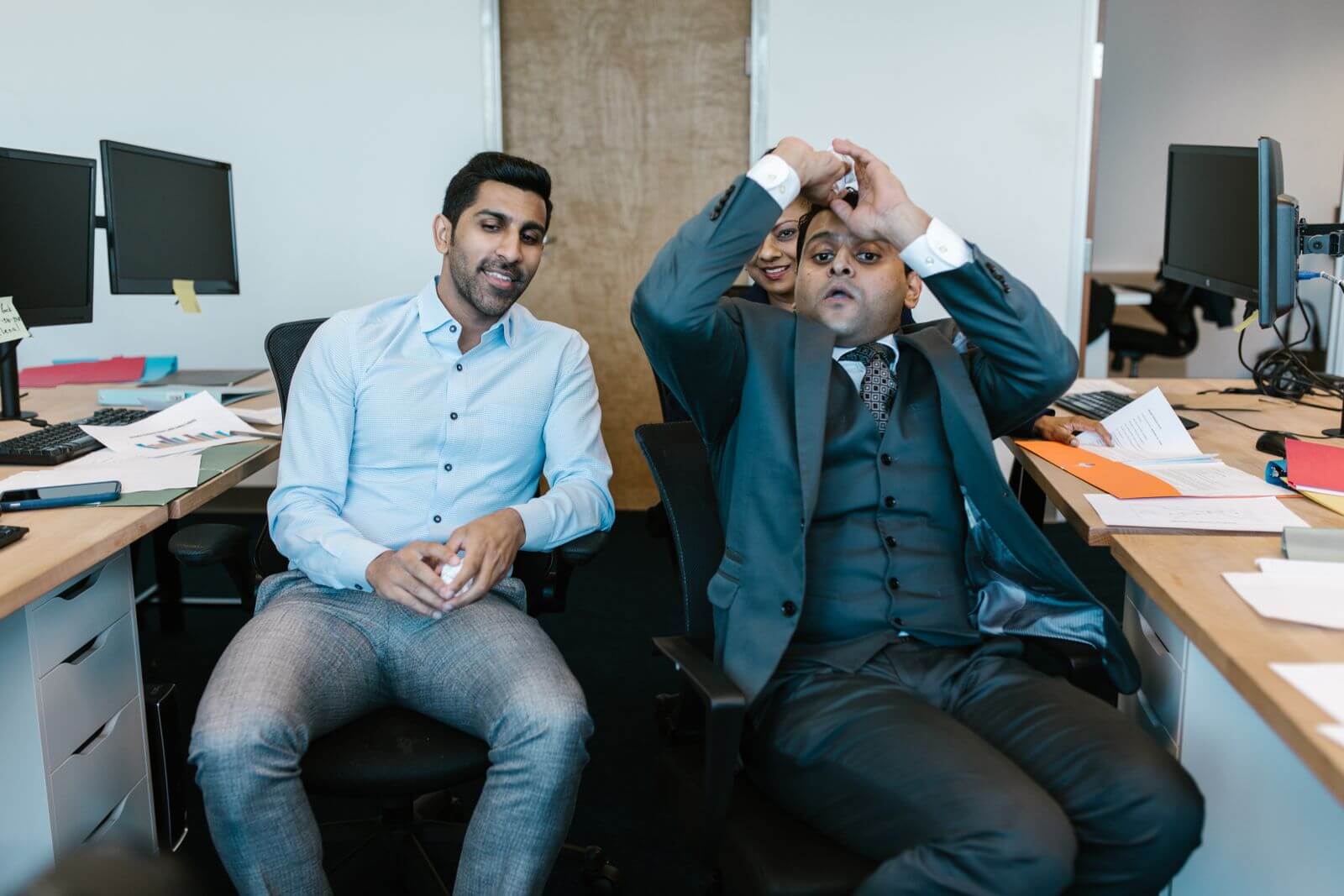 Indian colleagues collaborating in an office