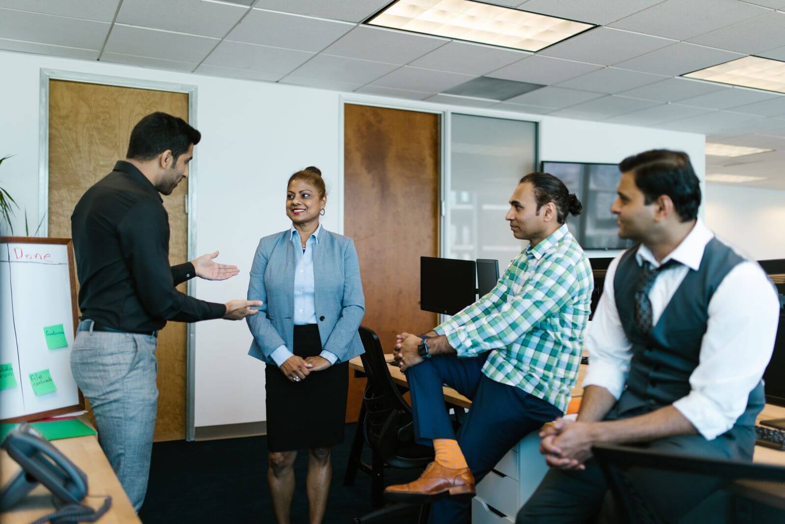 Indian business team collaborating during a project meeting