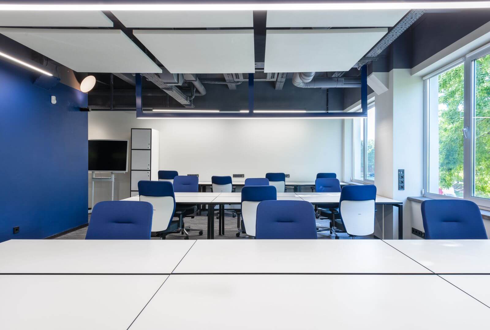 Bright modern office with flexible desks and natural light